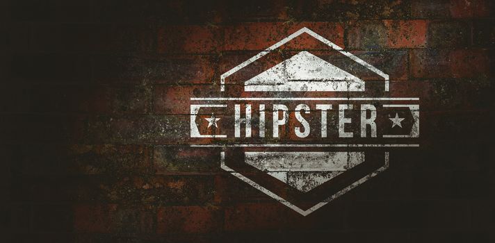 Hipster logo against texture of bricks wall