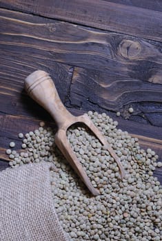 Lentils on wooden table in the kitchen