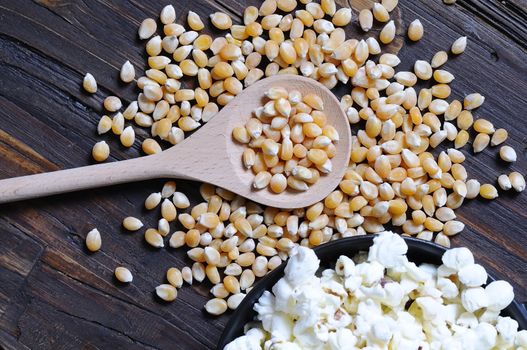 Freshly made popcorn on a wooden table