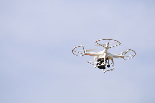 Flying drone in the sky. Flying with an drone for video and photo productions.