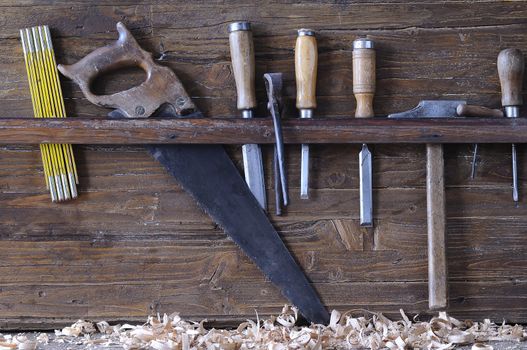 Carpenter tools on a work bench carpentry.