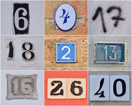 Different house numbers on walls