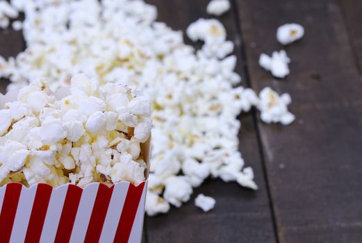 Freshly made popcorn on a wooden table
