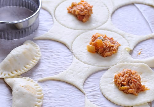 Small pies on the table, typical Spanish food.