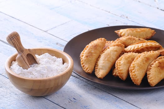 Small pies on the table, typical Spanish food.