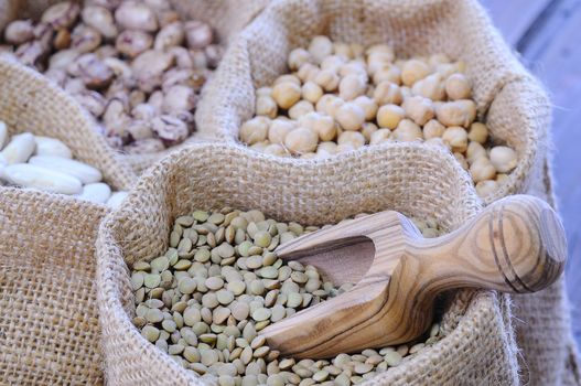 Close-up of different types of cereals assorted in bags.