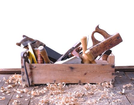Old toolbox on the workbench in a carpentry