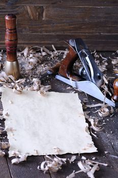 Carpenter tools with blank on the workbench carpentry.