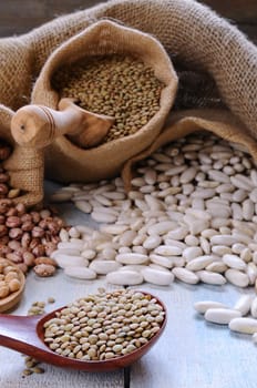 Lentils on wooden table in the kitchen