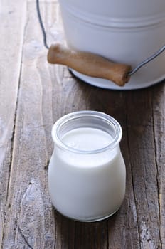 Homemade yogurt on wooden table in the kitchen