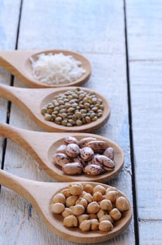 Legumes on wooden table in the kitchen