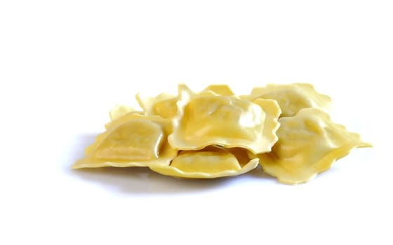 Isolated fresh ravioli at the kitchen table.