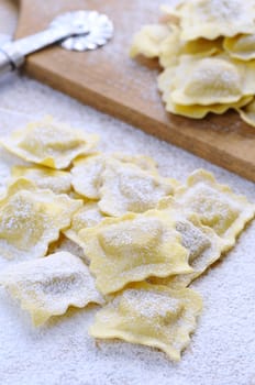 Preparing fresh ravioli at the kitchen table.