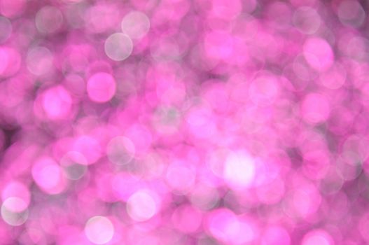 Magenta,Red colored abstract background with bokeh, for the new year and christmas