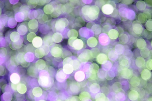 Magenta,lilac,purple,green,cyan,aquamarine colored abstract background with bokeh, for the new year and christmas