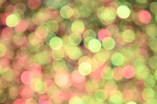 Green,red,orange,yellow colored abstract background with bokeh, for the new year and christmas