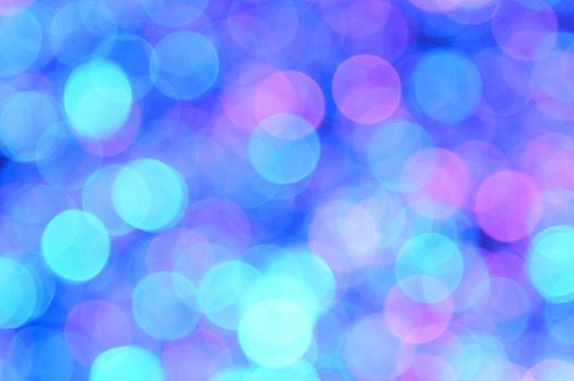 Magenta,Red,Blue,Cyan colored abstract background with bokeh, for the new year and christmas