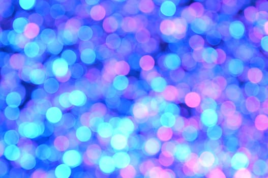 Magenta,Red,Blue,Cyan colored abstract background with bokeh, for the new year and christmas
