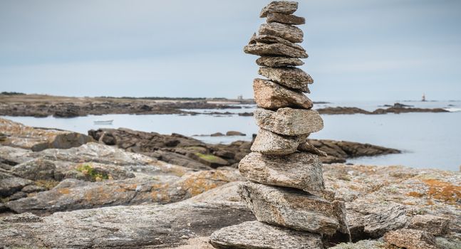 cairn on a hiking trail on the island of Yeu, France