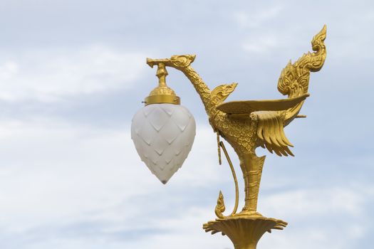 Golden swan lamp, a bird like creature common in both Buddhism