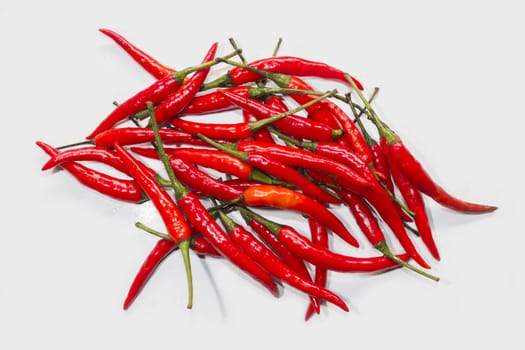 Group of red chilli pepper on white board,food background