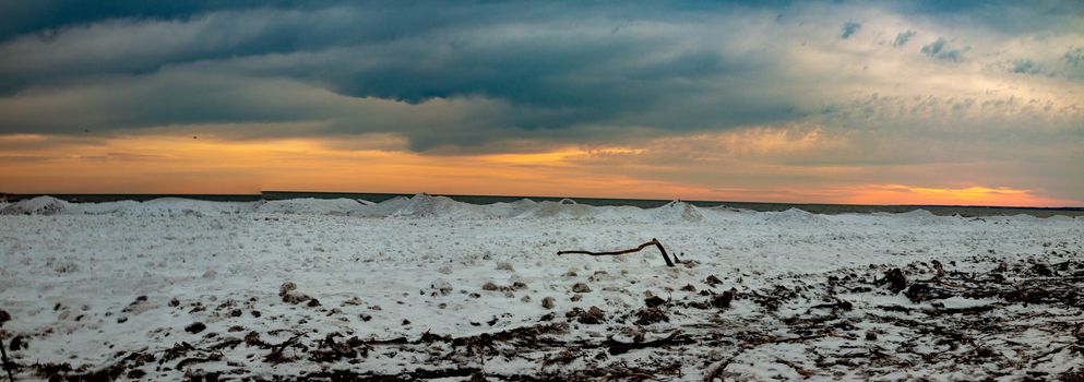 Sunset in the winter season over Port Stanley Ontario which is lake erie