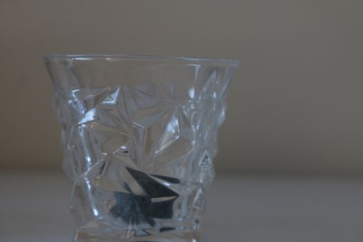 Whiskey glass and stone, studio stock photo 
