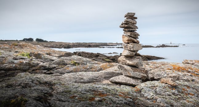 cairn on a hiking trail on the island of Yeu, France