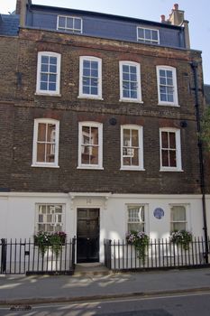 London, UK - April 27, 2011:  The archaeologist, war hero and writer T E Lawrence (1888 - 1935), popularly known as Lawrence of Arabia, lived in this Georgian townhouse in Westminster, London.
