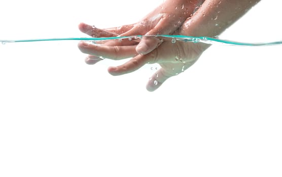 Washing hands in water for good hygiene and preventing the spread of the corona virus.