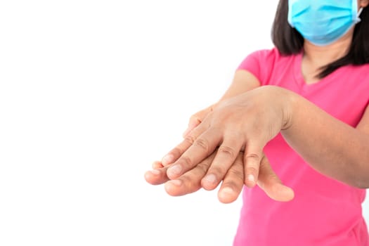 During the coronavirus (COVID-19) epidemic, A woman washing her hands with alcohol gel isolated on white background