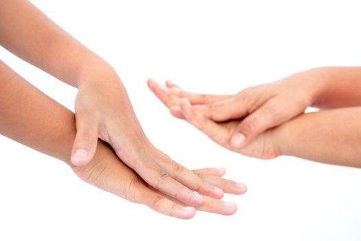 During the coronavirus epidemic mother teaches children to wash their hands with alcohol gel isolated on white background.