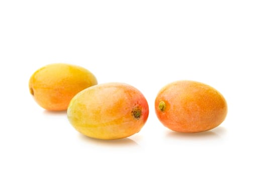 Fresh yellow mango fruit isolated on white background