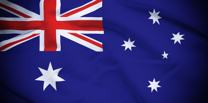 Wavy and rippled national flag of Australia background.