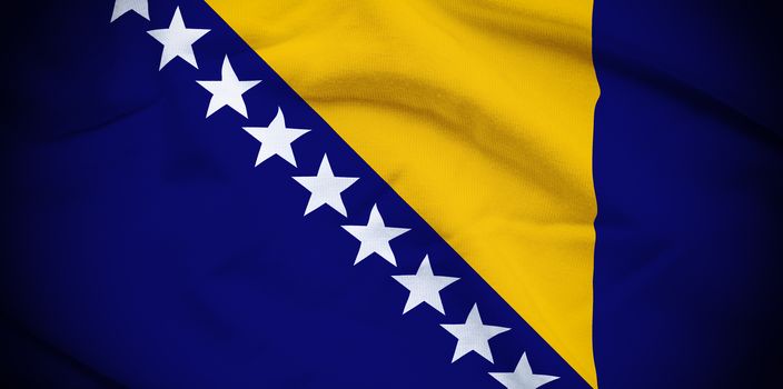 Wavy and rippled national flag of Bosnia and Herzegovina background.