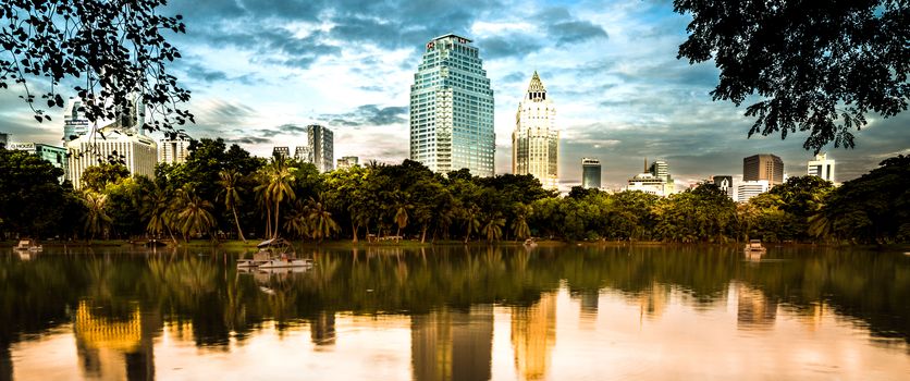 Skyline scene of group of office buildings in financial district of Bangkok, Thailand.