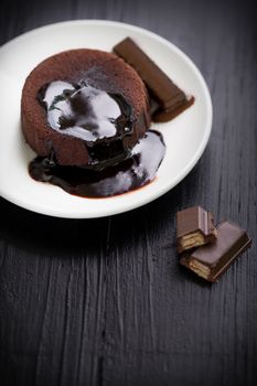 Chocolate lava cake with melting chocolate sauce.