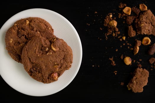 Chocolate chip cookie with hazelnut for coffee break.