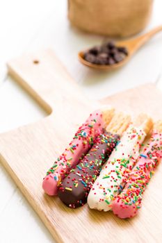 Colorful bread sticks for coffee break or tea break.