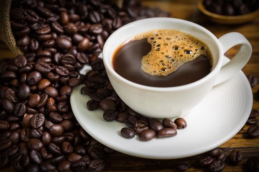 Warm coffee in white cup for relaxing moment.