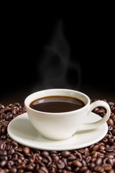 Warm coffee in white cup for relaxing moment.