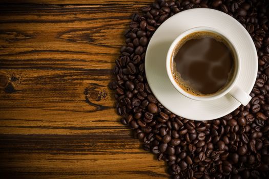 Warm coffee in white cup for relaxing moment.