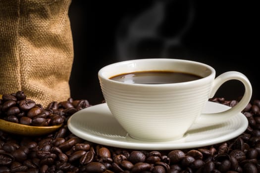 Warm coffee in white cup for relaxing moment.