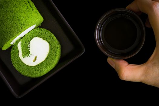 Green tea cake with tea cup for relaxing time.