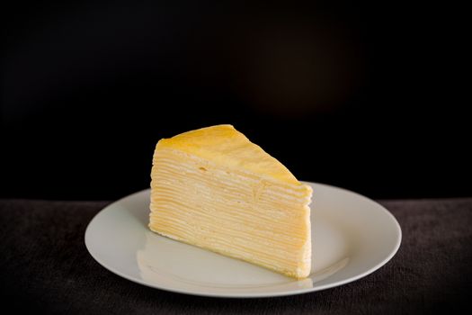 Slice of cake as snack for tea or coffee break.