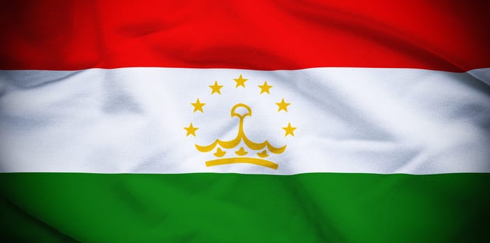 Wavy and rippled national flag of Tajikistan background.