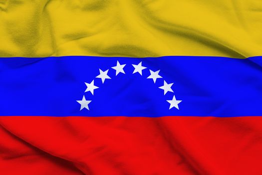 Wavy and rippled national flag of Venezuela background.