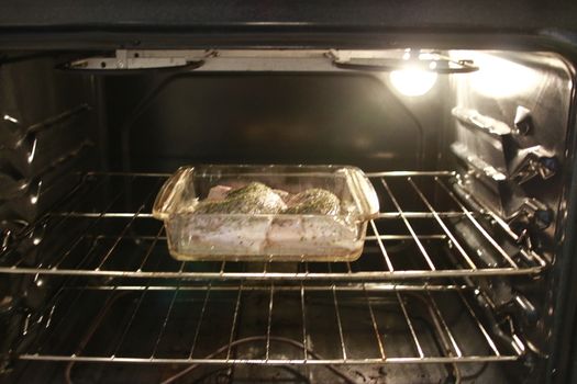 Seasoned chicken breast. Ready for roast in oven