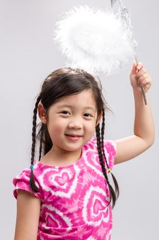 Young girl in fairy costume on isolated white background.