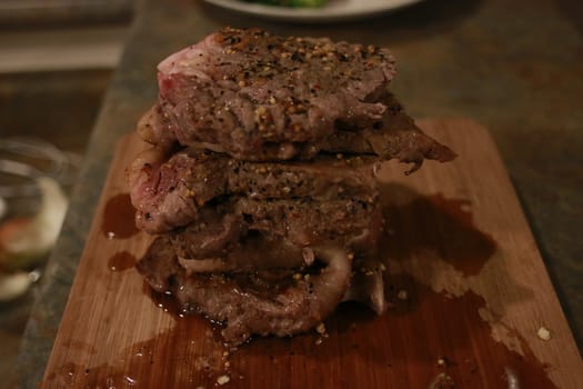 slices of steak on a meat fork